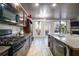 Kitchen with stainless steel appliances, granite countertops, and natural light at 529 Dasheill Ln, Atlanta, GA 30349
