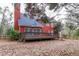 Brick house with deck and large backyard at 7715 Bold Springs Xing, Cumming, GA 30041