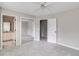 Spacious bedroom with mirrored closet doors and carpet at 7715 Bold Springs Xing, Cumming, GA 30041