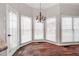 Bright breakfast nook with hardwood floors and lots of natural light at 7715 Bold Springs Xing, Cumming, GA 30041