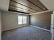 This bedroom features a tray ceiling with a modern design and a neutral color palette at 222 Depot Landing Rd # 58, Auburn, GA 30011