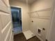 View of a laundry room featuring a washer/dryer hookup and a wire rack at 222 Depot Landing Rd # 58, Auburn, GA 30011