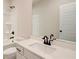 Simple bathroom with white vanity and large mirror at 222 Depot Landing Rd # 58, Auburn, GA 30011