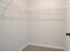 Spacious walk-in closet with wire shelving at 222 Depot Landing Rd # 58, Auburn, GA 30011