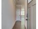 Light and bright entry hallway with wood-look floors at 222 Depot Landing Rd # 58, Auburn, GA 30011