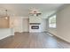 Living room with fireplace and wood-look floors at 222 Depot Landing Rd # 58, Auburn, GA 30011