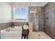 Bathroom with soaking tub and walk-in shower at 2799 Porches Ln, Dacula, GA 30019