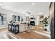 Spacious living room with hardwood floors, fireplace and built-in shelving at 2799 Porches Ln, Dacula, GA 30019