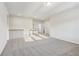 Spacious loft area with neutral carpeting and natural light at 2799 Porches Ln, Dacula, GA 30019