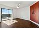 Bright bedroom with hardwood floors and access to balcony at 795 Hammond Dr # 1407, Atlanta, GA 30328