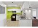 Granite countertops, white cabinets and black appliances in this updated kitchen at 795 Hammond Dr # 1407, Atlanta, GA 30328