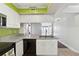 Modern kitchen with granite counters and white cabinets at 795 Hammond Dr # 1407, Atlanta, GA 30328