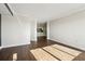 Bright living room with hardwood floors and view into adjacent kitchen at 795 Hammond Dr # 1407, Atlanta, GA 30328