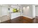 Open living space with hardwood floors and kitchen views at 795 Hammond Dr # 1407, Atlanta, GA 30328