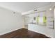 Spacious living area with dark hardwood floors at 795 Hammond Dr # 1407, Atlanta, GA 30328