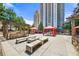 Community outdoor kitchen with grill and fire pit at 795 Hammond Dr # 1407, Atlanta, GA 30328