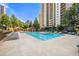 Refreshing swimming pool with plenty of lounge chairs at 795 Hammond Dr # 1407, Atlanta, GA 30328