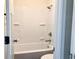 Clean white bathroom with a tub and shower combo at 195 Ridgecrest Way, Stockbridge, GA 30281