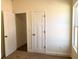 Bedroom with fresh paint, plush carpeting, closet and bright window at 195 Ridgecrest Way, Stockbridge, GA 30281