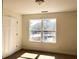 Bright bedroom with a large window and a closet at 195 Ridgecrest Way, Stockbridge, GA 30281