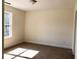 Bedroom features neutral carpeting, white walls, and a window at 195 Ridgecrest Way, Stockbridge, GA 30281