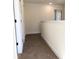 Hallway features neutral carpeting, white walls, and white doors at 195 Ridgecrest Way, Stockbridge, GA 30281