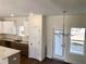 Bright kitchen featuring a center island and a view of the dining room at 195 Ridgecrest Way, Stockbridge, GA 30281