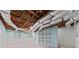 Spacious basement with exposed ductwork, shelving, and painted accent walls at 1878 Hamby Place Nw Dr, Acworth, GA 30102