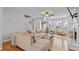 Bright and airy living room with hardwood floors, neutral colors, and plenty of seating at 1878 Hamby Place Nw Dr, Acworth, GA 30102