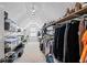 Spacious walk-in closet with an array of shelves and plenty of hanging space at 1878 Hamby Place Nw Dr, Acworth, GA 30102
