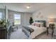 Bright bedroom with metal bed frame and window at 214 Depot Landing Rd # 62, Auburn, GA 30011