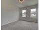 Spacious bedroom with neutral walls and carpet at 214 Depot Landing Rd # 62, Auburn, GA 30011
