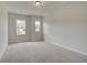 Bright bedroom with neutral walls and carpet at 214 Depot Landing Rd # 62, Auburn, GA 30011