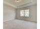 Bright bedroom with carpeted floor and large window at 214 Depot Landing Rd # 62, Auburn, GA 30011