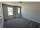 Bedroom with new carpet, recessed lighting, and plenty of natural light at 214 Depot Landing Rd # 62, Auburn, GA 30011