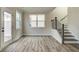 Bright dining area with hardwood floors and view of backyard at 214 Depot Landing Rd # 62, Auburn, GA 30011