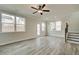 Spacious living room with hardwood floors and access to patio at 214 Depot Landing Rd # 62, Auburn, GA 30011