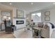 Cozy living room featuring a fireplace and comfortable seating at 214 Depot Landing Rd # 62, Auburn, GA 30011