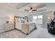 Spacious main bedroom with plush carpet and ceiling fan at 214 Depot Landing Rd # 62, Auburn, GA 30011