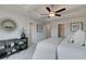 Main bedroom with carpeted floor and ceiling fan at 214 Depot Landing Rd # 62, Auburn, GA 30011