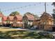 Row of colorful shops with metal roofs and wooden fences at 214 Depot Landing Rd # 62, Auburn, GA 30011