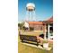 View of Auburn town square with a water tower at 214 Depot Landing Rd # 62, Auburn, GA 30011
