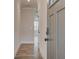 Light and bright entryway with hardwood floors and modern door at 216 Depot Landing Rd # 61, Auburn, GA 30011