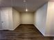 Versatile flex room featuring luxury vinyl plank flooring, perfect for an office or playroom at 216 Depot Landing Rd # 61, Auburn, GA 30011