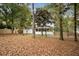 Private backyard with wooded area, providing a peaceful setting at 425 Shepard Sw Dr, Marietta, GA 30064