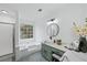 Modern bathroom with a soaking tub, updated vanity, and a walk-in shower at 425 Shepard Sw Dr, Marietta, GA 30064