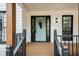 Light teal front door accented with a decorative wreath, adds curb appeal at 425 Shepard Sw Dr, Marietta, GA 30064