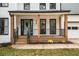 Charming front porch features wooden posts, black railing, and a light teal front door at 425 Shepard Sw Dr, Marietta, GA 30064