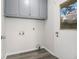 Laundry room with window and room for storage at 2540 Thornton Dr, Atlanta, GA 30349