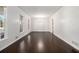 Spacious room with gleaming hardwood floors, lots of natural light at 2540 Thornton Dr, Atlanta, GA 30349